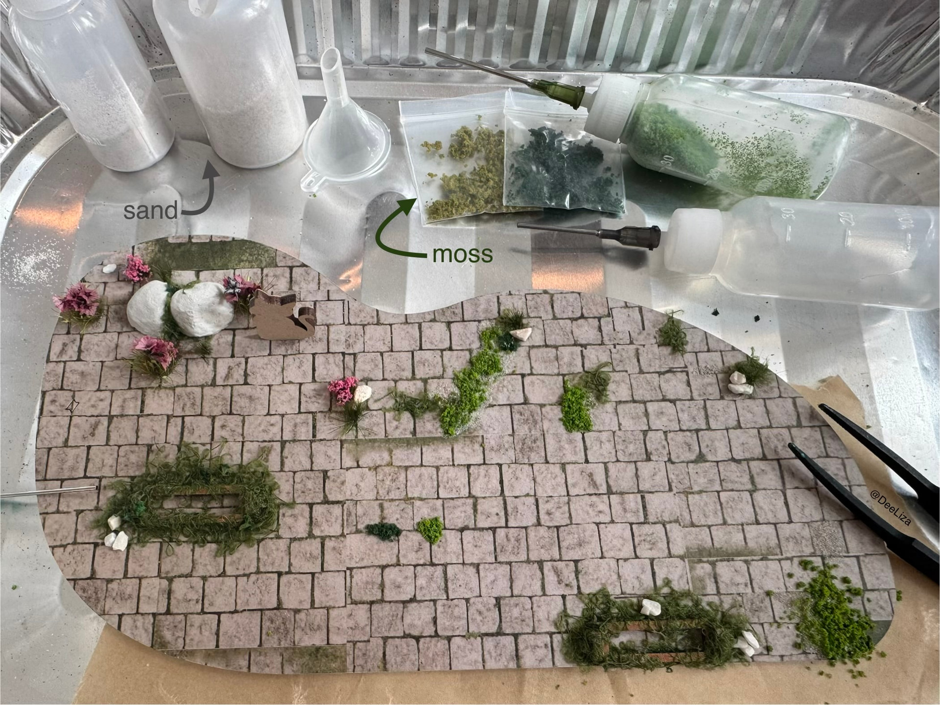 Close view of stones and greenery on the customized base