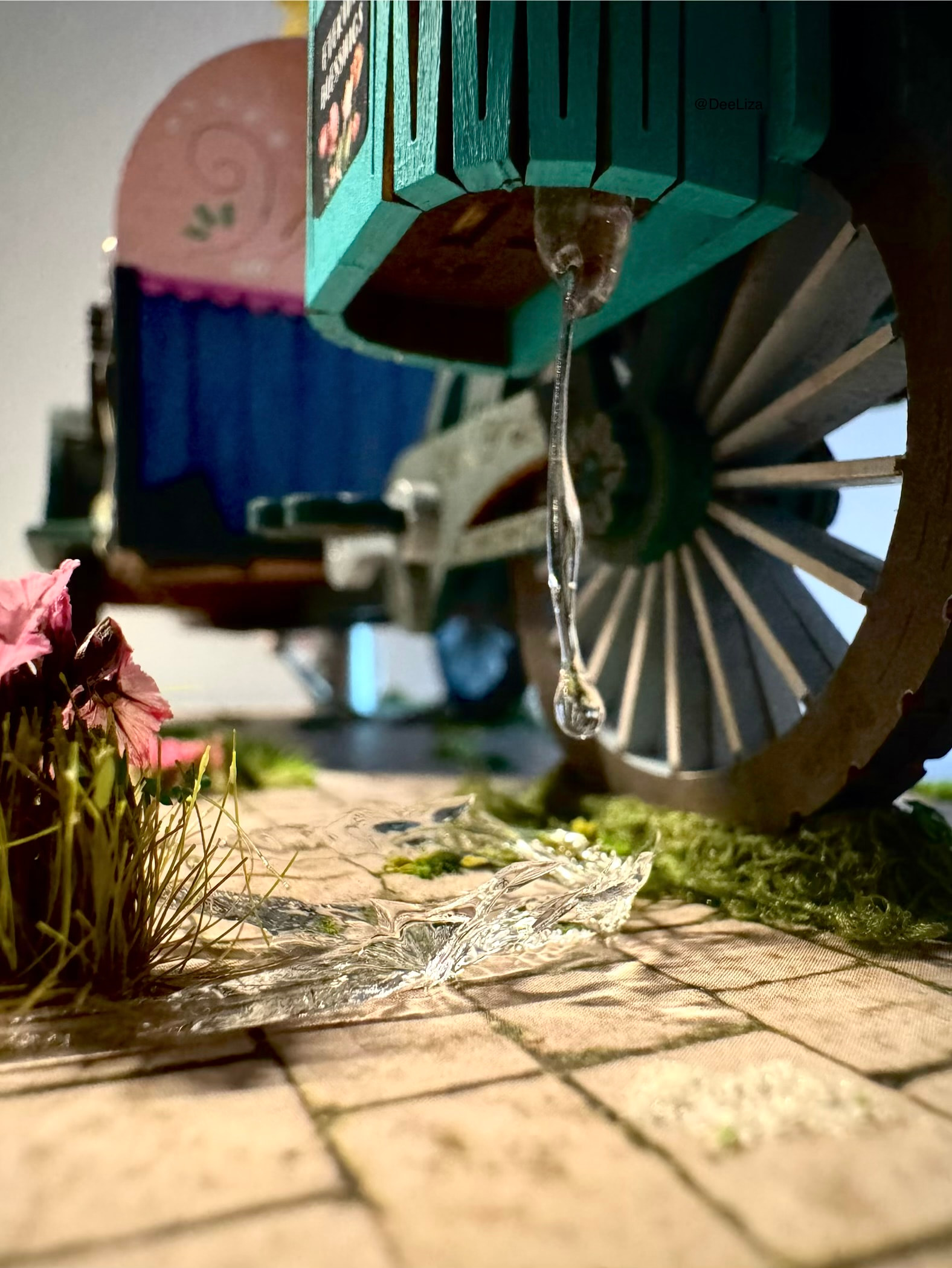 The handmade puddle on DeeLiza's landscaped Blossom Cart base