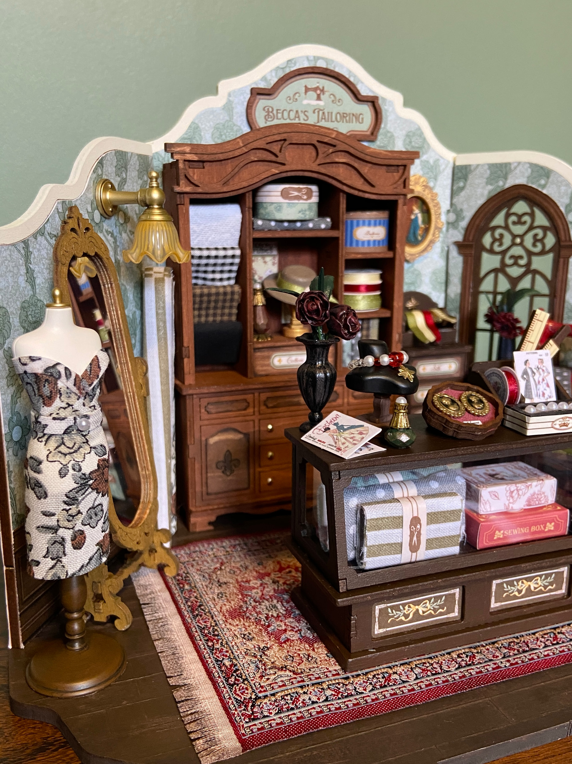 BexBee’s handmade patterned dress displayed on a mannequin in the customized Rolife tailoring studio