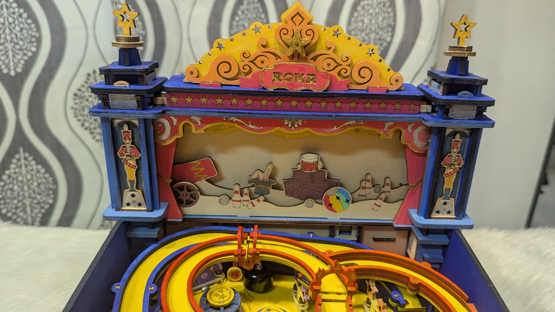 Close view of the hand-painted circus marquee and upper ramps on Jill's ROKR Pinball Machine